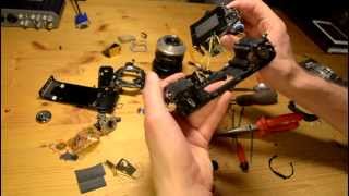 Minolta X300 SLR camera Disassembly [upl. by Lettie]