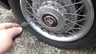 Wire Disc Hubcap Removal amp Installment [upl. by Dadelos312]