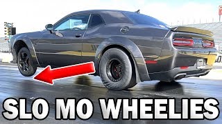 Watch Dozens of Dodge Demon WHEELIES in Slow Motion [upl. by Bowen]