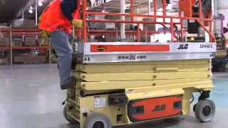 Scissor Aerial Lift Training JLG ES [upl. by Marjory498]