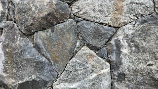 Secrets to creating a beautiful NATURAL STONE WALL Insights from a real stonemason [upl. by Bore952]