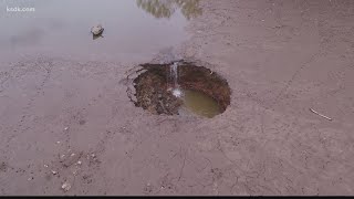 Sinkhole drains lake at Lone Elk Park [upl. by Akitan]