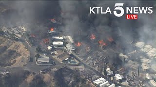 Brush Fire Engulfs Mobile Home Park Near Calimesa California [upl. by Atsirc]