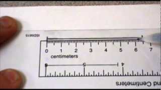 Measuring to the nearest cm and mm [upl. by Fira]