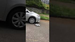 Replacing a Toyota Corolla hubcap [upl. by Amor758]