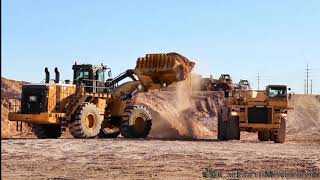 A new CAT 992K loading 773D Athey bottom dumps [upl. by Ahsieat338]